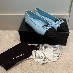CHANEL Light Blue Leather Ballet Flats with Black Cap Toe
